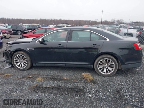 2014 Ford Taurus Limited with VIN 1FAHP2F81EG113984, listed as a IAAI auction lot 41542792 with 213,206 mi miles. Bid and sale history available at carsss.com. Image 15.