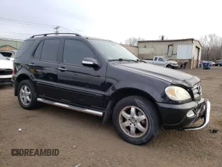 2003 Mercedes-Benz M-Class with VIN 4JGAB75E63A448619, listed as a Copart auction lot 88395555 with 93,849 mi miles and Salvage Title. Bid and sale history available at carsss.com. Image 4.
