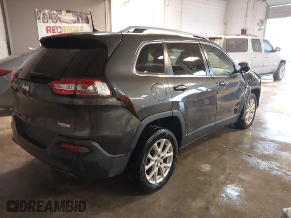 2016 Jeep Cherokee Altitude z VIN 1C4PJLCB0GW338970, wystawiony jako IAAI lot #41559196 z przebiegiem 129 366 mil mil oraz . Historia ofert i sprzedaży dostępna na DreamBid. Obrazek 4.