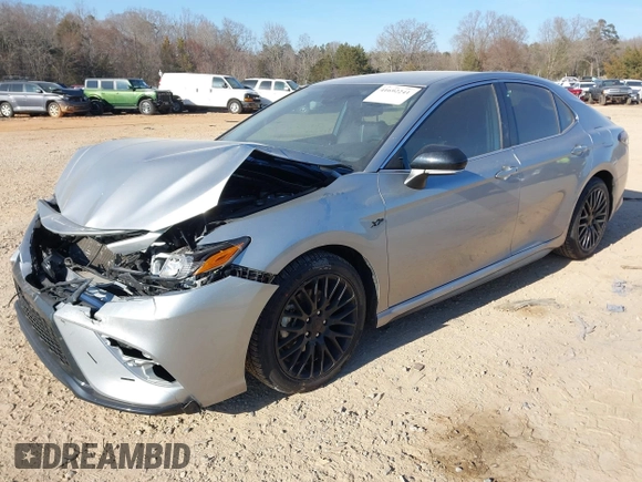 2023 Toyota Camry SE with VIN 4T1G11AK4PU099549, listed as a IAAI auction lot 41692241 with 63,835 mi miles. Bid and sale history available at carsss.com. Image 2.