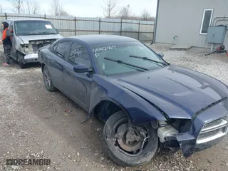 2014 Dodge Charger Police with VIN 2C3CDXAG0EH194638, listed as a IAAI auction lot 41442469 with 116,634 mi miles. Bid and sale history available at carsss.com. Image 1.