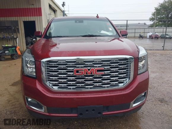 2020 GMC Yukon Denali with VIN 1GKS2CKJ5LR129592, listed as a IAAI auction lot 39806304 with 71,125 mi miles. Bid and sale history available at carsss.com. Image 12.