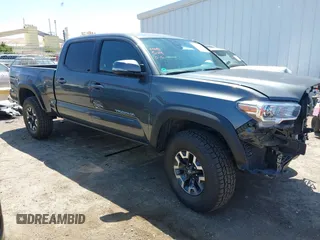 2023 Toyota Tacoma SR5 z VIN 3TMDZ5BN6PM153633, wystawiony jako IAAI lot #42353187 z przebiegiem 50 020 mil mil oraz . Historia ofert i sprzedaży dostępna na DreamBid. Obrazek 1.