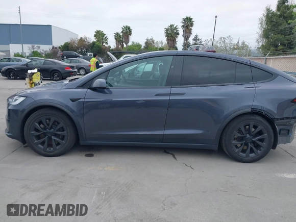 2022 Tesla Model X Plaid with VIN 7SAXCBE6XNF337687, listed as a IAAI auction lot 42035097 with 18,756 mi miles and . Bid and sale history available at DreamBid. Image 15.