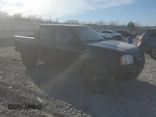 2004 Nissan Frontier XE z VIN 1N6ED27T24C482171, wystawiony jako Copart lot #42026145 z przebiegiem 221 942 mil mil oraz Szkoda całkowita • Salvage title. Historia ofert i sprzedaży dostępna na DreamBid. Obrazek 4.