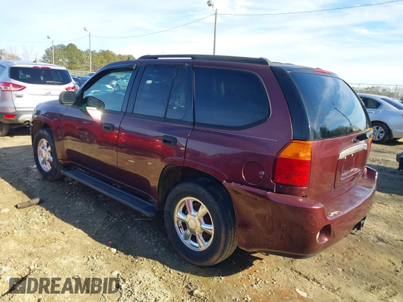 2007 GMC Envoy SLE with VIN 1GKDS13S472201367, listed as a IAAI auction lot 41327646 with 232,019 mi miles. Bid and sale history available at carsss.com. Image 6.