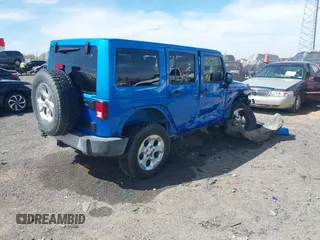 2015 Jeep Wrangler Unlimited Sahara z VIN 1C4HJWEG5FL650829, wystawiony jako IAAI lot #41824739 z przebiegiem 127 719 mil mil oraz . Historia ofert i sprzedaży dostępna na DreamBid. Obrazek 4.
