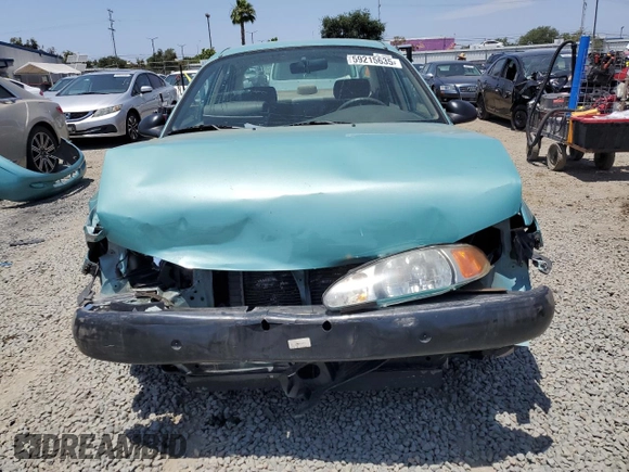 1999 Ford Escort LX with VIN 1FAFP10P6XW196483, listed as a Copart auction lot 59215635 with 74,859 mi miles and Salvage title. Bid and sale history available at DreamBid. Image 5.