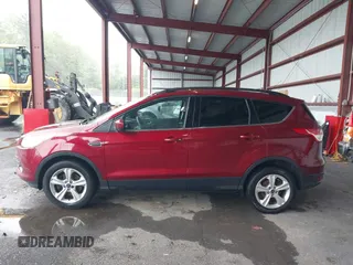 2016 Ford Escape SE с VIN 1FMCU9GX4GUB10282, выставлен на аукционе IAAI как лот 42335883 с пробегом 126 248 миль миль и . История ставок и продаж доступна на DreamBid. Изображение 14.