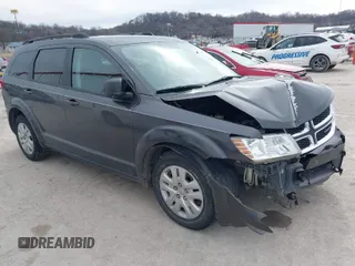 2017 Dodge Journey SE with VIN 3C4PDCABXHT694909, listed as a IAAI auction lot 41640828 with 188,657 mi miles and . Bid and sale history available at DreamBid. Image 1.