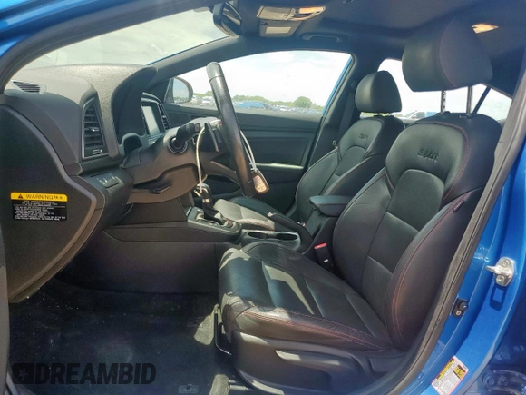 2018 Hyundai Elantra Sport с VIN KMHD04LB1JU485342, выставлен на аукционе Copart как лот 59653875 с пробегом 77 936 миль миль и Списание • Salvage title. История ставок и продаж доступна на DreamBid. Изображение 7.