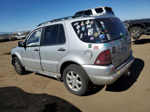 2000 Mercedes-Benz M-Class with VIN 4JGAB72E3YA172993, listed as a Copart auction lot 47051815 with 112,355 mi miles and Salvage Title. Bid and sale history available at carsss.com. Image 2.