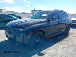 2025 BMW X5 sDrive40i with VIN 5UX13EU01S9W88784, listed as a IAAI auction lot 41631766 with 12,805 mi miles. Bid and sale history available at carsss.com. Image 18.