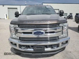2017 Ford F-350 Lariat with VIN 1FT8W3DT7HED26111, listed as a Copart auction lot 48925405 with 147,787 mi miles and Salvage title. Bid and sale history available at DreamBid. Image 5.