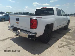 2014 Chevrolet Silverado 1500 LTZ with VIN 3GCUKSEJ7EG526217, listed as a IAAI auction lot 42214663 with 232,805 mi miles and . Bid and sale history available at DreamBid. Image 4.