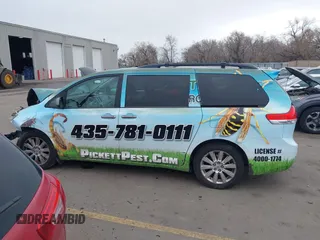 2012 Toyota Sienna XLE with VIN 5TDDK3DC3CS033755, listed as a IAAI auction lot 41815132 with 189,777 mi miles. Bid and sale history available at carsss.com. Image 14.