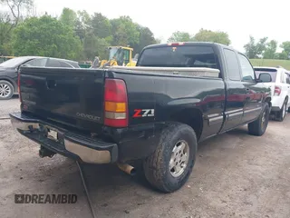 2001 Chevrolet Silverado 1500 LS with VIN 1GCEK19T11E256199, listed as a IAAI auction lot 42088180 with 253,252 mi miles. Bid and sale history available at carsss.com. Image 4.