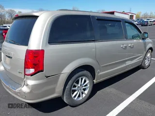 2013 Dodge Grand Caravan SXT with VIN 2C4RDGCGXDR635008, listed as a IAAI auction lot 41859146 with 133,119 mi miles and . Bid and sale history available at DreamBid. Image 4.