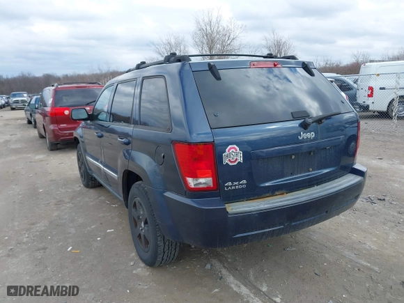 2010 Jeep Grand Cherokee Laredo with VIN 1J4PR4GK5AC138498, listed as a IAAI auction lot 41870740 with 130,551 mi miles. Bid and sale history available at carsss.com. Image 3.