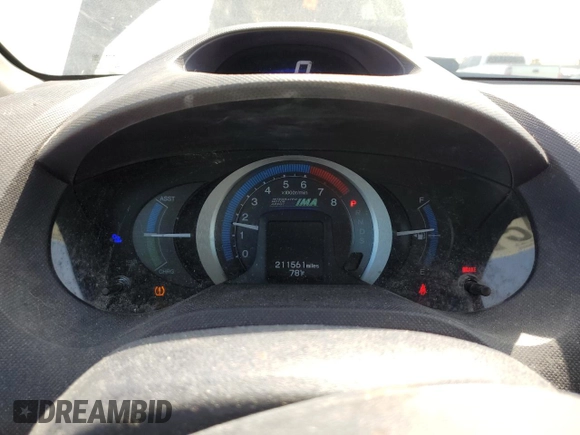 2010 Honda Insight EX with VIN JHMZE2H7XAS021268, listed as a Copart auction lot 54179245 with 211,561 mi miles and Salvage Title. Bid and sale history available at DreamBid. Image 9.