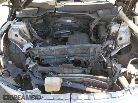 2012 MINI Countryman with VIN WMWZB3C58CWM02843, listed as a Copart auction lot 52131715 with Not Provided miles and Salvage Title. Bid and sale history available at DreamBid. Image 13.