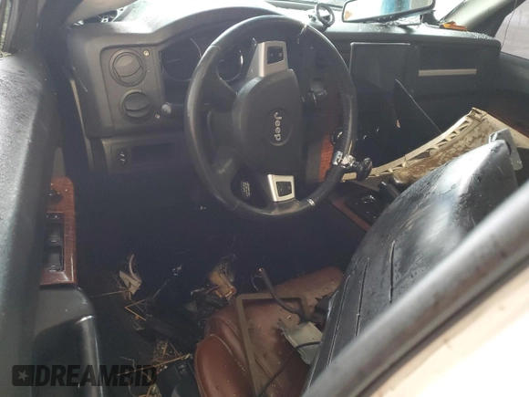 2008 Jeep Commander Limited с VIN 1J8HG58N48C236729, выставлен на аукционе Copart как лот 86342984 с пробегом Не указан миль и Списание • Salvage title. История ставок и продаж доступна на DreamBid. Изображение 8.