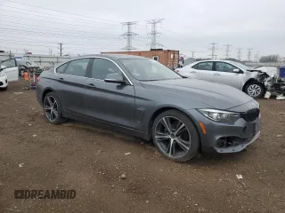 2020 BMW 4 Series 430i xDrive with VIN WBA4J3C00LBL11929, listed as a Copart auction lot 52501055 with 141,791 mi miles and Salvage title. Bid and sale history available at DreamBid. Image 4.