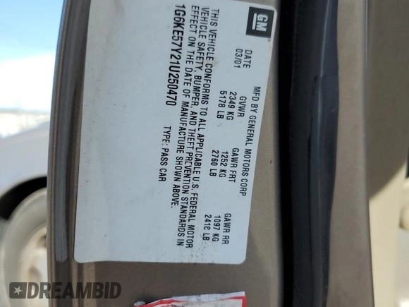 2001 Cadillac DeVille DHS z VIN 1G6KE57Y21U250470, wystawiony jako Copart lot #57334785 z przebiegiem 66 703 mil mil oraz Tytuł czysty. Historia ofert i sprzedaży dostępna na DreamBid. Obrazek 12.