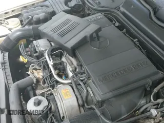 1995 Mercedes-Benz SL 5.0L with VIN WDBFA67E9SF124892, listed as a IAAI auction lot 41887530 with 160,942 mi miles and . Bid and sale history available at DreamBid. Image 12.