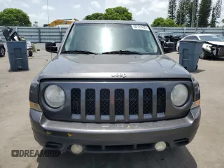 2014 Jeep Patriot High Altitude with VIN 1C4NJPFA2ED888925, listed as a Copart auction lot 60191435 with 122,308 mi miles and Salvage title. Bid and sale history available at DreamBid. Image 5.