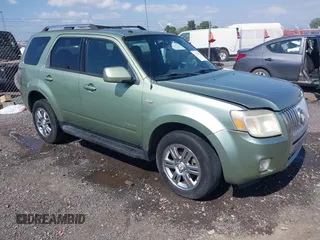 2008 Mercury Mariner Premier z VIN 4M2CU87128KJ17796, wystawiony jako IAAI lot #42296965 z przebiegiem 273 153 mil mil oraz . Historia ofert i sprzedaży dostępna na DreamBid. Obrazek 1.
