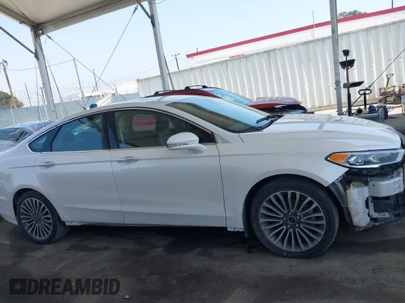 2017 Ford Fusion Hybrid Titanium with VIN 3FA6P0RU8HR229653, listed as a IAAI auction lot 42445182 with 163,279 mi miles and . Bid and sale history available at DreamBid. Image 13.