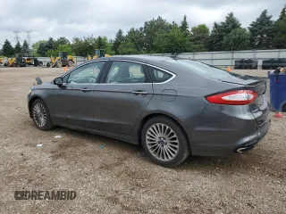 2016 Ford Fusion Titanium with VIN 3FA6P0K96GR317413, listed as a Copart auction lot 61256585 with 91,915 mi miles and Salvage title. Bid and sale history available at DreamBid. Image 2.