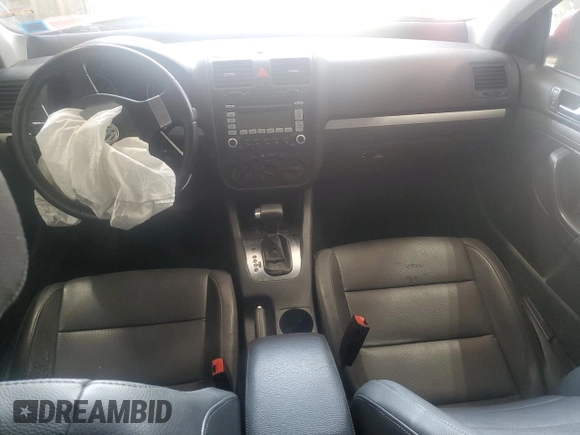 2009 Volkswagen Jetta SE z VIN 3VWRZ71KX9M127514, wystawiony jako Copart lot #59872955 z przebiegiem Nie podano mil oraz Szkoda całkowita • Salvage title. Historia ofert i sprzedaży dostępna na DreamBid. Obrazek 8.