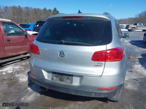 2017 Volkswagen Tiguan Wolfsburg Edition with VIN WVGSV7AX6HK031070, listed as a IAAI auction lot 41621220 with 138,048 mi miles. Bid and sale history available at carsss.com. Image 16.