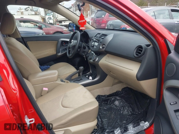 2010 Toyota RAV4 with VIN JTMBF4DV2AD028526, listed as a IAAI auction lot 41821599 with 140,624 mi miles. Bid and sale history available at carsss.com. Image 5.