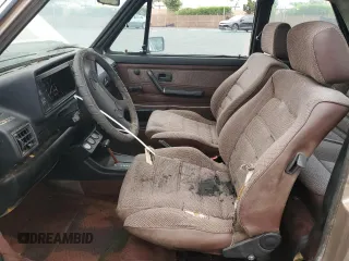 1984 Volkswagen Rabbit z VIN WVWCA0152EK015292, wystawiony jako Copart lot #55503315 z przebiegiem 216 970 mil mil oraz Tytuł czysty. Historia ofert i sprzedaży dostępna na DreamBid. Obrazek 7.