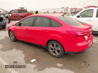 2017 Ford Focus SE with VIN 1FADP3FE8HL328221, listed as a IAAI auction lot 41813348 with 76,400 mi miles and . Bid and sale history available at carsss.com. Image 3.