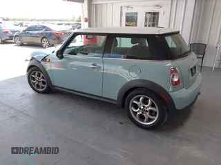 2012 MINI Hardtop with VIN WMWSU3C55CT261047, listed as a IAAI auction lot 42160995 with 123,879 mi miles and . Bid and sale history available at DreamBid. Image 3.