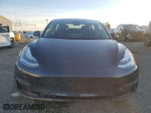 2020 Tesla Model 3 Performance z VIN 5YJ3E1EC1LF719481, wystawiony jako Copart lot #86930884 z przebiegiem 69 645 mil mil oraz Szkoda całkowita • Salvage title. Historia ofert i sprzedaży dostępna na DreamBid. Obrazek 5.