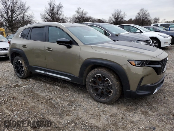 2023 Mazda CX-50 2.5 Turbo with VIN 7MMVABXY6PN137936, listed as a Copart auction lot 82888874 with Not provided miles and Salvage title. Bid and sale history available at DreamBid. Image 4.