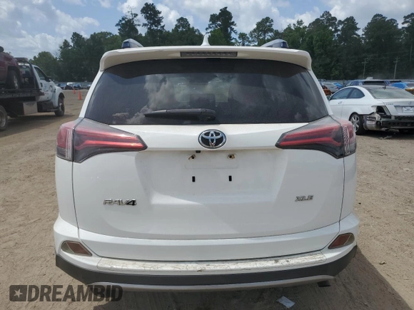 2018 Toyota RAV4 XLE with VIN JTMWFREV3JJ727033, listed as a Copart auction lot 59967025 with 145,990 mi miles and Clean title. Bid and sale history available at DreamBid. Image 6.