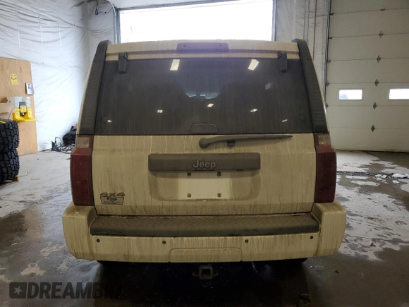 2010 Jeep Commander Sport z VIN 1J4RG4GK2AC158450, wystawiony jako Copart lot #46210865 z przebiegiem 222 500 mil mil oraz Szkoda całkowita • Salvage title. Historia ofert i sprzedaży dostępna na DreamBid. Obrazek 6.