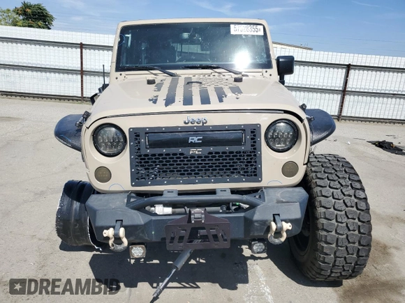 2016 Jeep Wrangler Unlimited Rubicon z VIN 1C4HJWFGXGL236560, wystawiony jako Copart lot #57528355 z przebiegiem 64 634 mil mil oraz Szkoda całkowita • Salvage title. Historia ofert i sprzedaży dostępna na DreamBid. Obrazek 5.