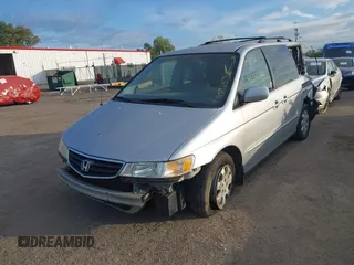 2003 Honda Odyssey EX-L with VIN 5FNRL18973B007802, listed as a IAAI auction lot 40365765 with 278,759 mi miles and . Bid and sale history available at DreamBid. Image 13.