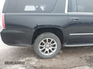 2017 GMC Yukon XL Denali with VIN 1GKS2HKJ2HR310377, listed as a IAAI auction lot 41153582 with 130,194 mi miles. Bid and sale history available at carsss.com. Image 20.