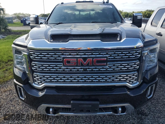 2023 GMC Sierra 3500HD Denali z VIN 1GT49WEY9PF135123, wystawiony jako Copart lot #74175484 z przebiegiem Nie podano mil oraz Nie do naprawy • Non repairable. Historia ofert i sprzedaży dostępna na DreamBid. Obrazek 5.