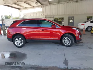 2024 Cadillac XT5 FWD Luxury with VIN 1GYKNAR42RZ738679, listed as a IAAI auction lot 42355530 with 14,660 mi miles and . Bid and sale history available at DreamBid. Image 13.
