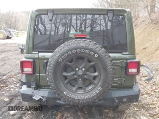 2021 Jeep Wrangler Unlimited Willys with VIN 1C4HJXDNXMW579595, listed as a IAAI auction lot 41930989 with 32,148 mi miles and . Bid and sale history available at DreamBid. Image 17.