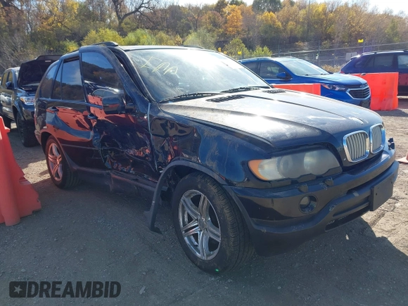 2001 BMW X5 4.4i with VIN WBAFB33581LH08039, listed as a IAAI auction lot 40679627 with 1 mi miles. Bid and sale history available at carsss.com. Image 1.